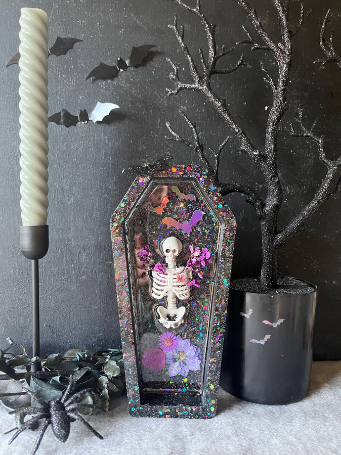 Blooming remains coffin decor